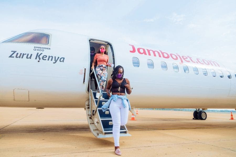 Guests stepping off a plane